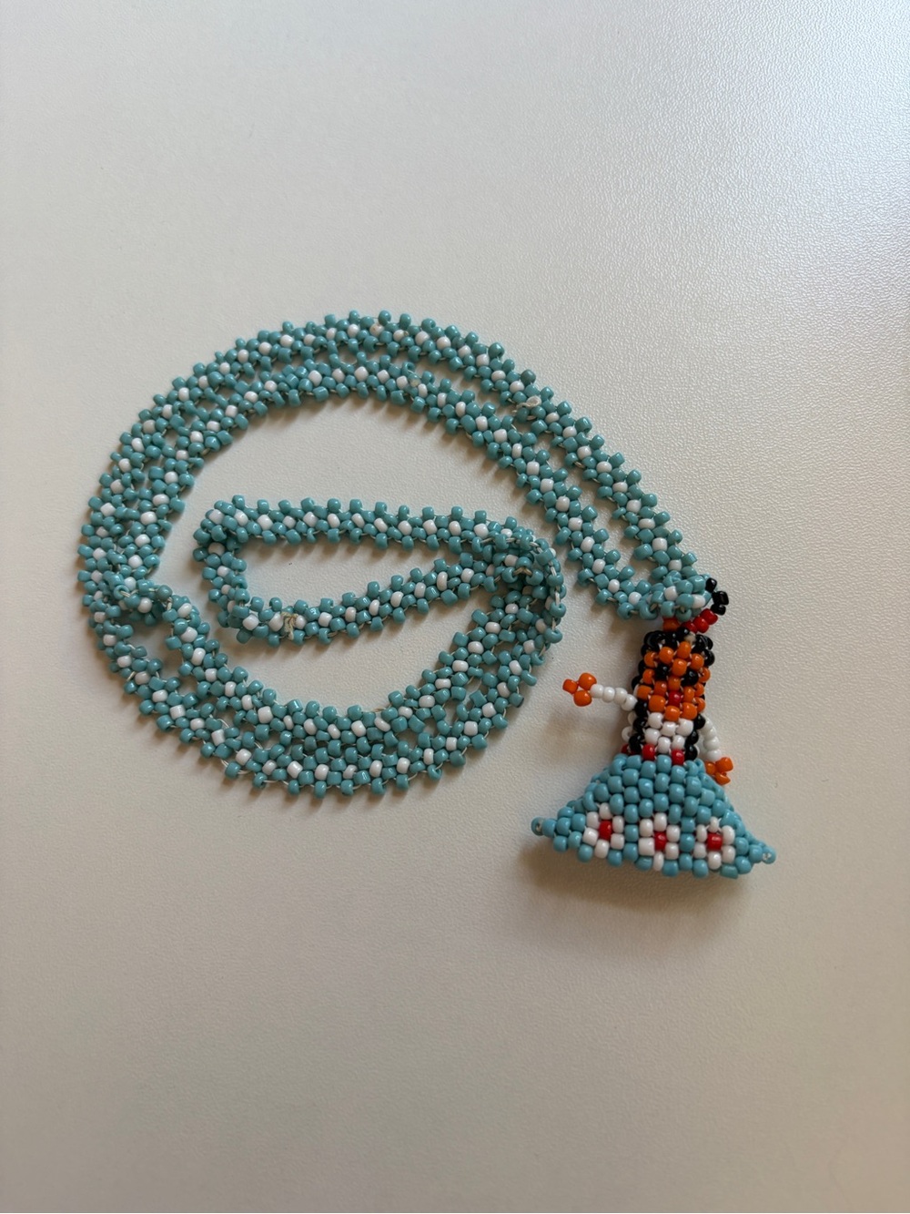 Turquoise Beaded Senorita Doll Pendant Necklace